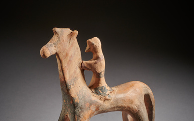 An Archaic Greek terracotta horse and rider, mid-6th century B.C.