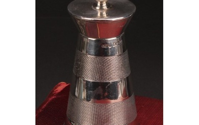 An Art Deco style silver spreading cylindrical pepper grinde...