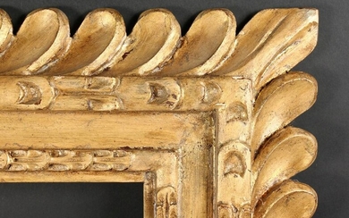 An Early 20th Century Carved Wood Frame with a Heavy