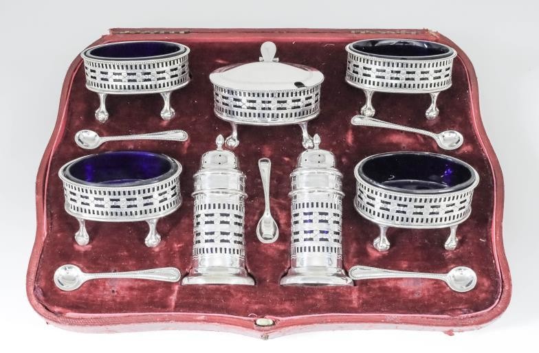 An Edward VII Silver Seven Piece Condiment Set, by...