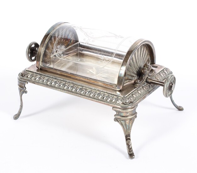 An Edwardian silver plated rotating butter dish, of rectangular form cast with gadroons