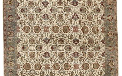 An Indian oversize Agra design carpet, all over design of rosettes, palmettes, arabesques and Herati motifs. 20th/21st century. 607×498 cm.