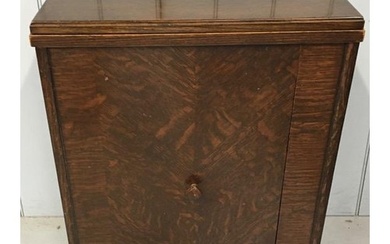 An antique sewing machine cabinet. Dimensions(cm) H79, W56/1...