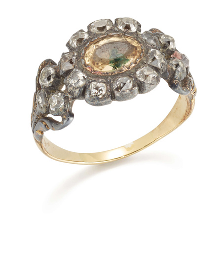 An early 19th century diamond and foiled topaz ring, the...