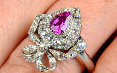 An early 20th century gold ruby and diamond bow ring.