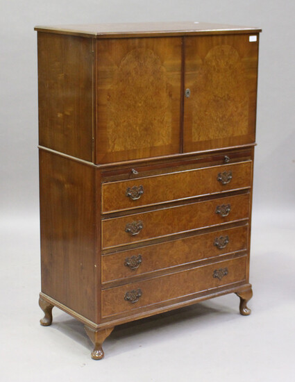 An early/mid-20th century burr walnut tallboy, fitted with a cupboard above a slide and four drawers