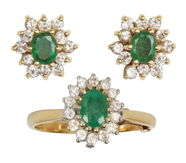 An emerald and diamond ring and pair of earrings, each of cluster design, centring on an oval mixed-cut emerald within a surround of brilliant-cut diamonds, ring size P, post fittings