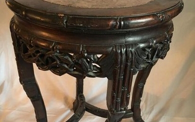 An ironwood stool with bamboo decoration, the openwork...