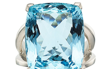 Aquamarine, Platinum Ring The ring features a cushion-shaped aquamarine...