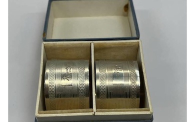 BOXED PAIR SILVER NAPKIN RINGS WITH ENGINE TURNED DECORATION...