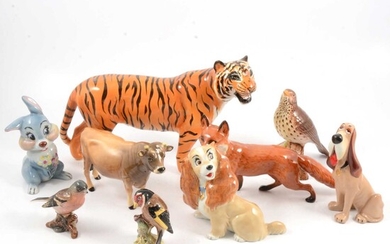 Beswick tiger and other animals and birds, and Wade Disney blow-ups.