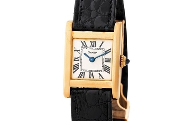 Cartier London. Attractive Tank Rectangular-Shape Wristwatch in Yellow Gold, With Silver Roman Numbers Dial