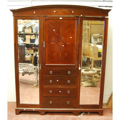 Edwardian mahogany and inlaid wardrobe, the arched projected...
