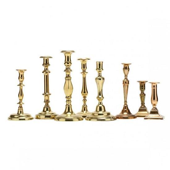 Eight Antique Brass Candlesticks