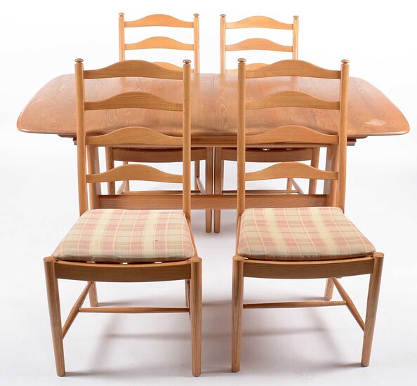 Ercol: modern elm refectory style extending dining table; and four dining chairs.