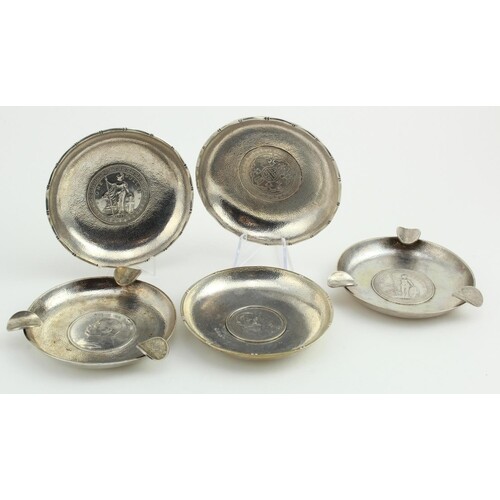 Five silver / white metal coin ashtrays with GB Trade Dollar...