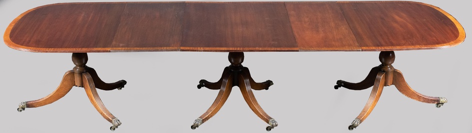 GEORGE III STYLE INLAID MAHOGANY THREE-PEDESTAL DINING TABLE 29 x 44 x 99 in. (73.7 x 111.8 x 251.5 cm.)