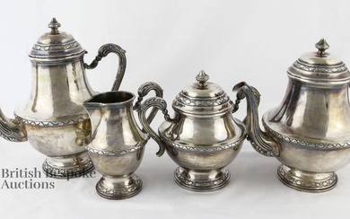 Generously proportioned silver (tested) four piece tea service, comprising coffee pot 1292.4 gms, tea pot 1233.4 gms, twin-handled sugar bowl 908 gms and cover and a large milk jug 461 gms, gross weight 3,894 gms.