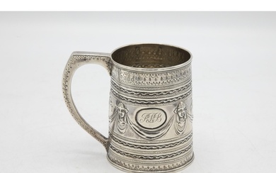 Good quality George III silver mug, embossed with masks and ...