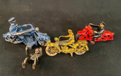 Group of 3 cast iron motorcycles and 1 policeman, including Champion Police motorcycle
