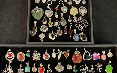 Group of Sterling and other costume jewelry pendants