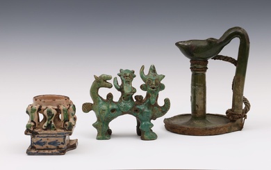 Iran, a green ceramic oil lamp, a mythological figure group and a faience tazza, 19th century and later;