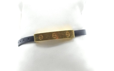 Leather bracelet with part in 18 ct yellow gold signed CARTIER and clasp in 18 ct yellow gold (scratched)