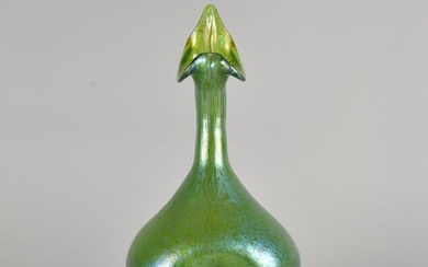 Loetz glassworks green glass vase with stretched goose neck surmounted by a Jack-in-the-Pulpit rim above a bulbous dimpled body, the body cased in a papillon petrol blue iridescent finish. Circa 1890. Height 25 cm