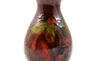 Moorcroft Pottery, a flambe 'Leaf and Berry' design vase