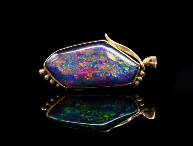 Opal triplet and 9ct yellow gold pendant marked 9ct ince. Ap...