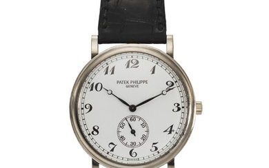 PATEK PHILIPPE, REF. 5022G-012, CALATRAVA, A FINE 18K WHITE GOLD WRISTWATCH WITH SUBSIDIARY SECONDS