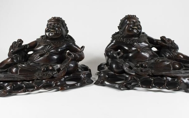 Pair Carved Hardwood Reclining Buddha Figures