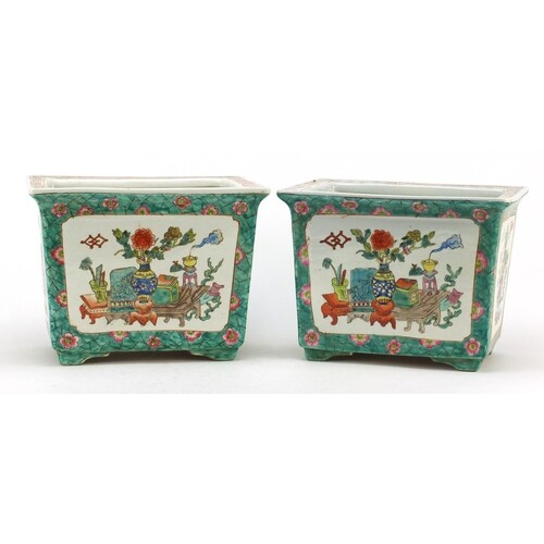 Pair of Chinese porcelain planters, each hand painted in the...
