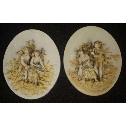 Pair of Continental courting couple wall plaques bisque cera...