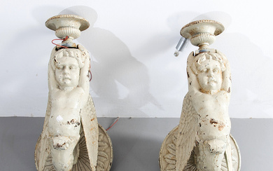 Pair of wall lamps in the shape of winged cherubs, France, 19th century.