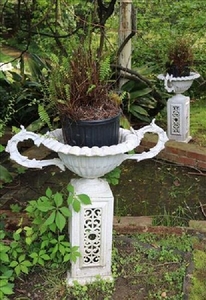 Pair of white garden urns with handles, 31 in. W.
