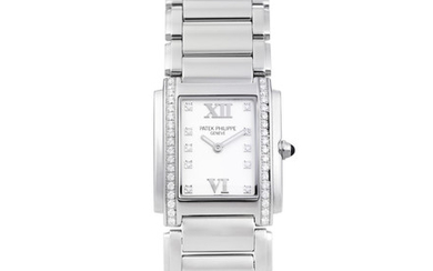 Patek Philippe. A Lady's Stainless Steel and Diamond-Set Bracelet Watch