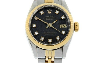 ROLEX - an Oyster Perpetual Datejust bracelet watch. Circa 1975. Stainless steel case with yellow