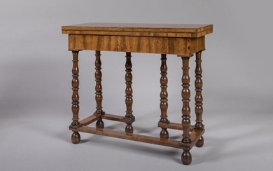 Rectangular shaped CHANGER TABLE in walnut veneer, plum tree filets, light wood. Beech frame and spacer. Top inlaid with flowers and lambrequins, opens in two parts. One part unveils three compartments, one of which contains a writing desk. An antique...