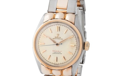 Rolex. Sought after and Desired Water-Resistant Automatic Wristwatch in Steel and Pink Gold, Reference 5353, With Red "Officially" Dial