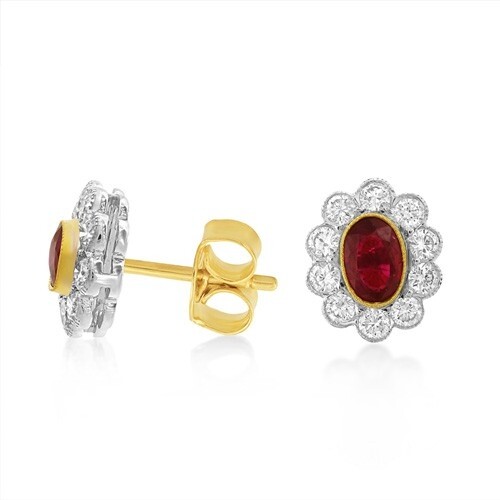 Ruby Earrings set with 1.06ct. Rubies and 0.78 ct. diamonds....