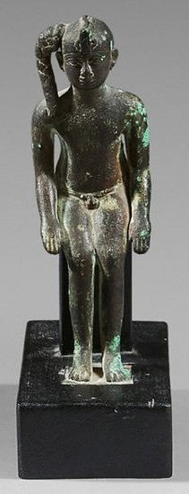 Statuette representing naked Harpocrates wearing the uraeus and...