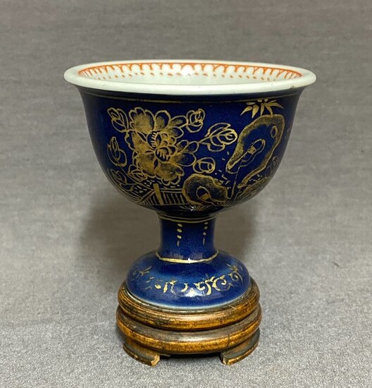 Stem cup - Powder blue - Porcelain - Chinese - Gold peonies besides a pierced rock and a fence - China - Kangxi (1662-1722)