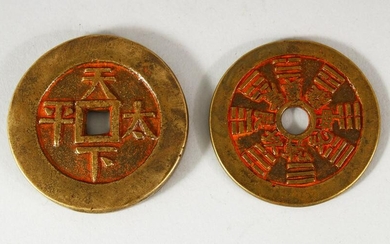 TWO CHINESE CURRENCY COINS - with residual poly chrome