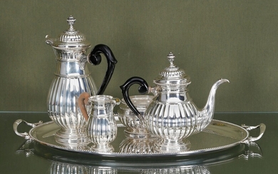 Tea service In silver (835‰) comprising 2 pourers, 1 sugar...