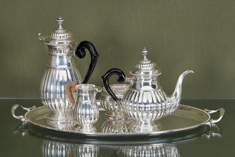 Tea service In silver (835‰) comprising 2 pourers, 1 sugar...