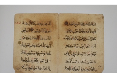 These two leaves are fragments from a Mamluk Qur'an, with ea...