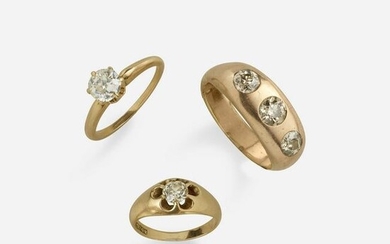 Three diamond and gold rings