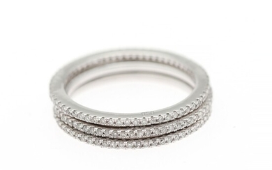 Three diamond eternity ring each set with numerous brilliant-cut diamonds, mounted in 14k white gold. Size 54.5 and 55.5. (3)