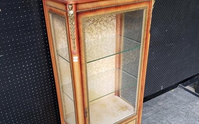 Transitional French Style Vitrine, having applied brass mounts, with stepped top, glass panel door with floral panel below & cabriol...